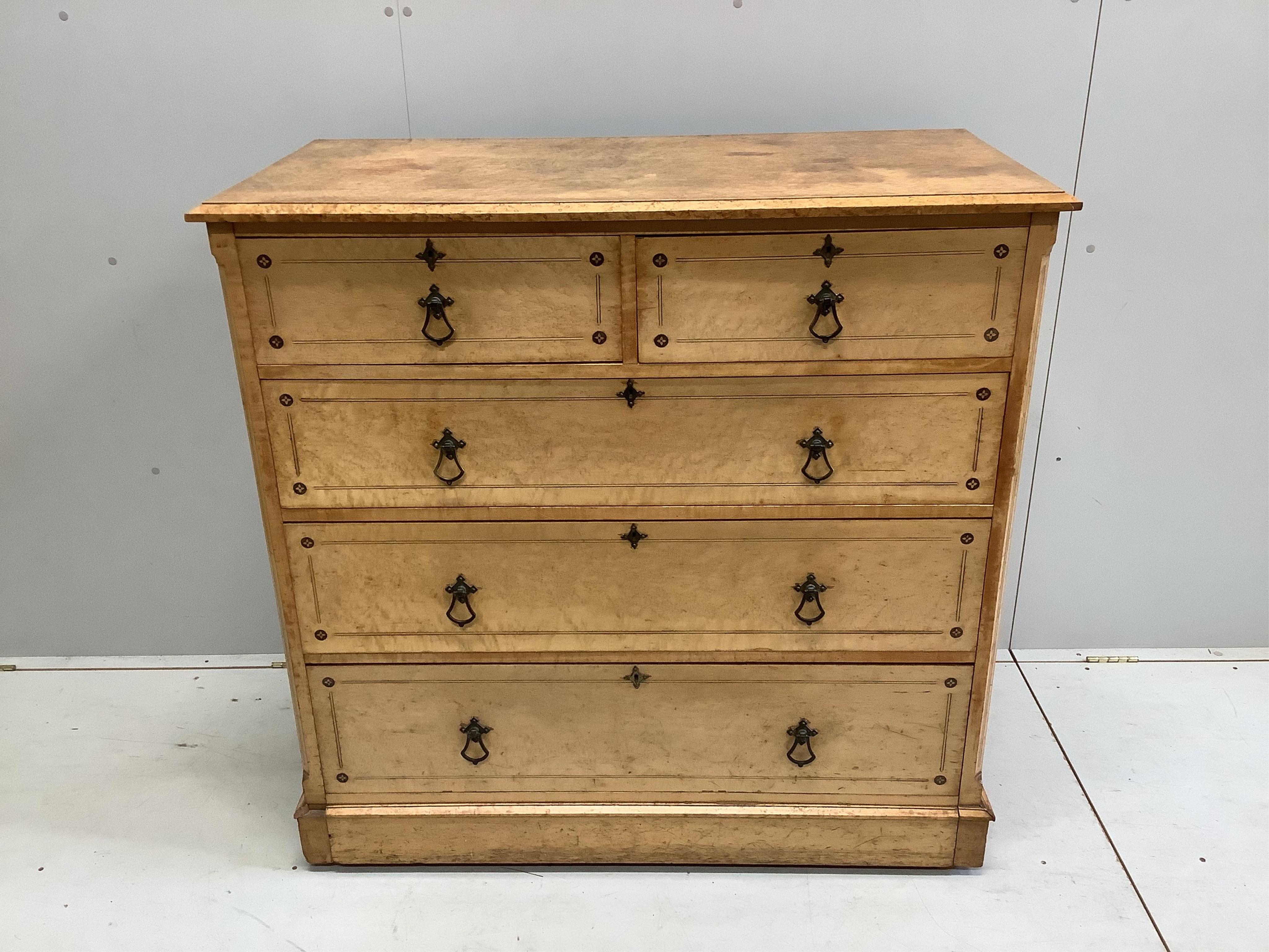 A late Victorian Gothic revival ebony inlaid, bird's eye maple bedroom suite, manner of Charles Bevan, comprising 5ft bed frame, kneehole dressing table, chest of drawers, marble top washstand, bedside cabinet, commode a